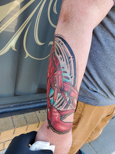 Explore jawline tattoo ideas, creative tattoo ideas in Orem, available at Hearts and Hands Tattoo and Piercing