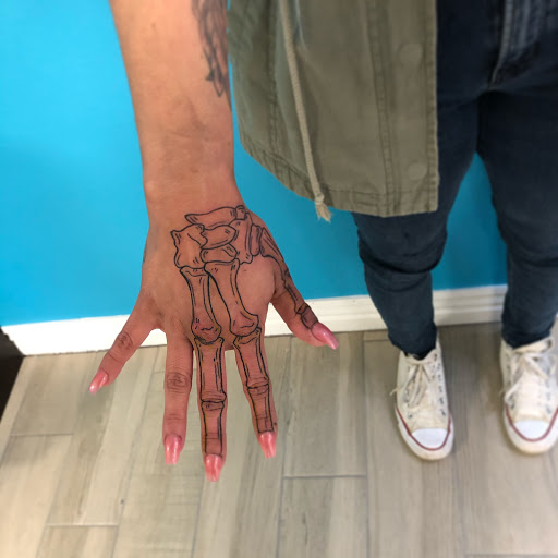 Explore cyber y2k tattoo ideas, creative tattoo ideas in Springdale, available at Tattoo Cartel