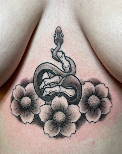 Explore back tattoos for men ideas, creative tattoo ideas in Marietta, available at Monkeys Uncle Tattoo