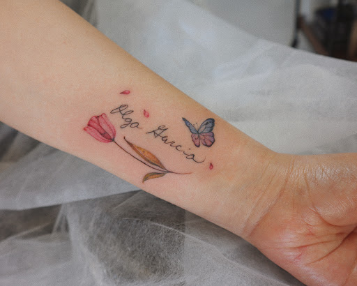 Explore aloha tattoo ideas, creative tattoo ideas in Orange, available at Baron Art Tattoo