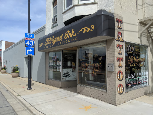 Explore trash tattoo ideas, creative tattoo ideas in Green Bay, available at Artrageous Ink