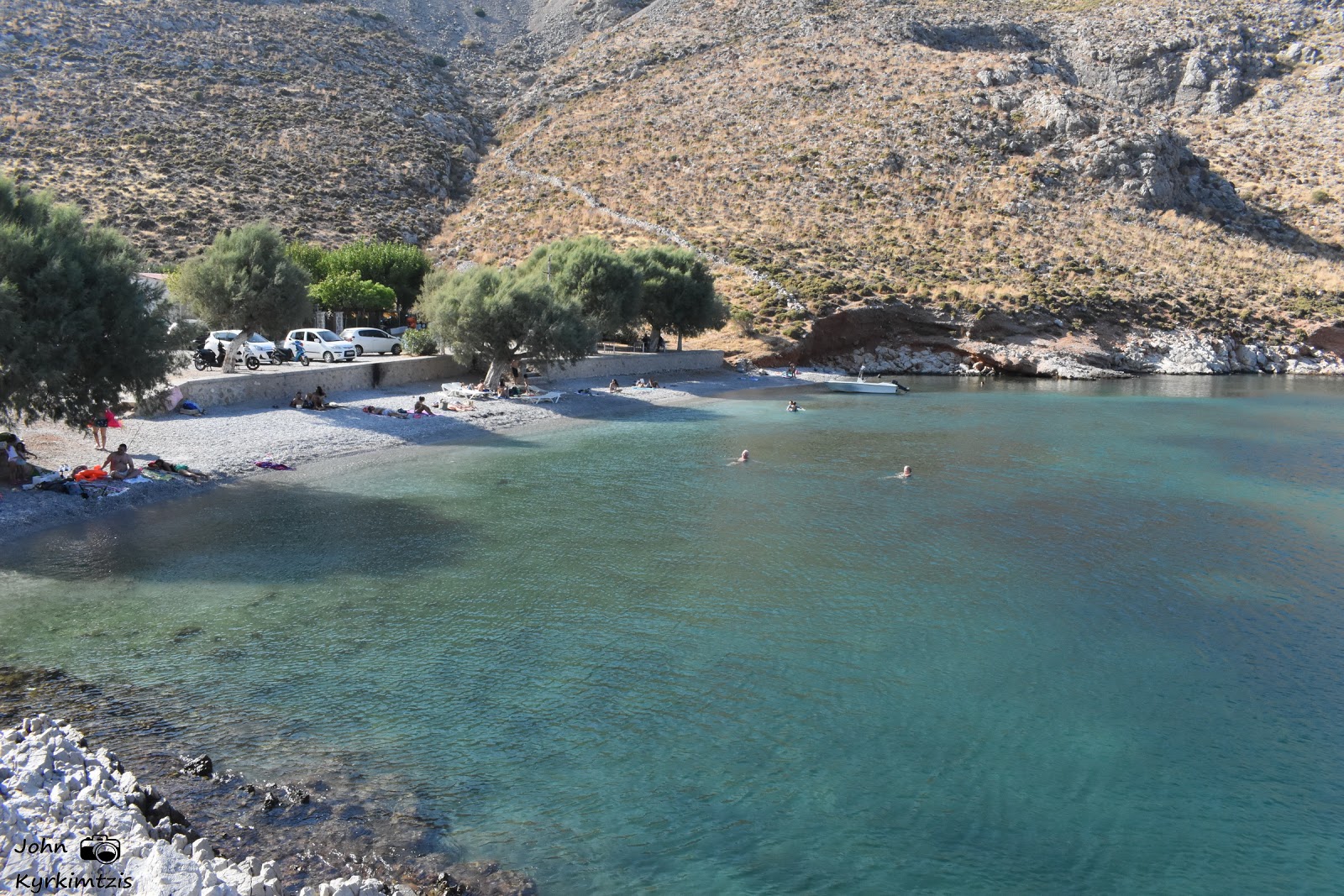 Photo of Akti with turquoise pure water surface