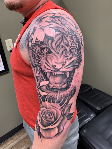 Explore rattlesnake tattoo ideas, creative tattoo ideas in Fargo, available at Golden Dragon Tattoo