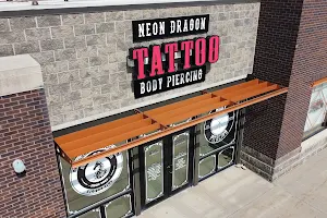 Neon Dragon Tattoo & Body Piercing image