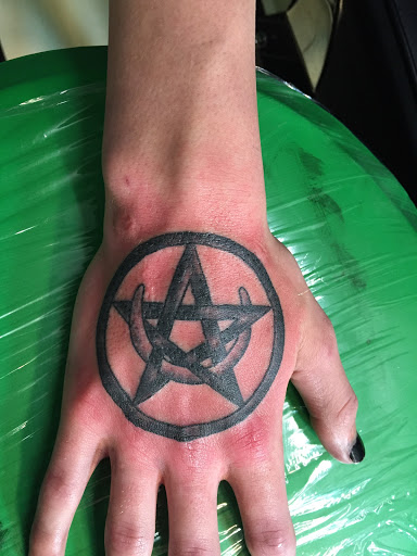 Explore tattoo ideas for dark skin guys, creative tattoo ideas in Hamilton, available at Glass Ink Tattoo