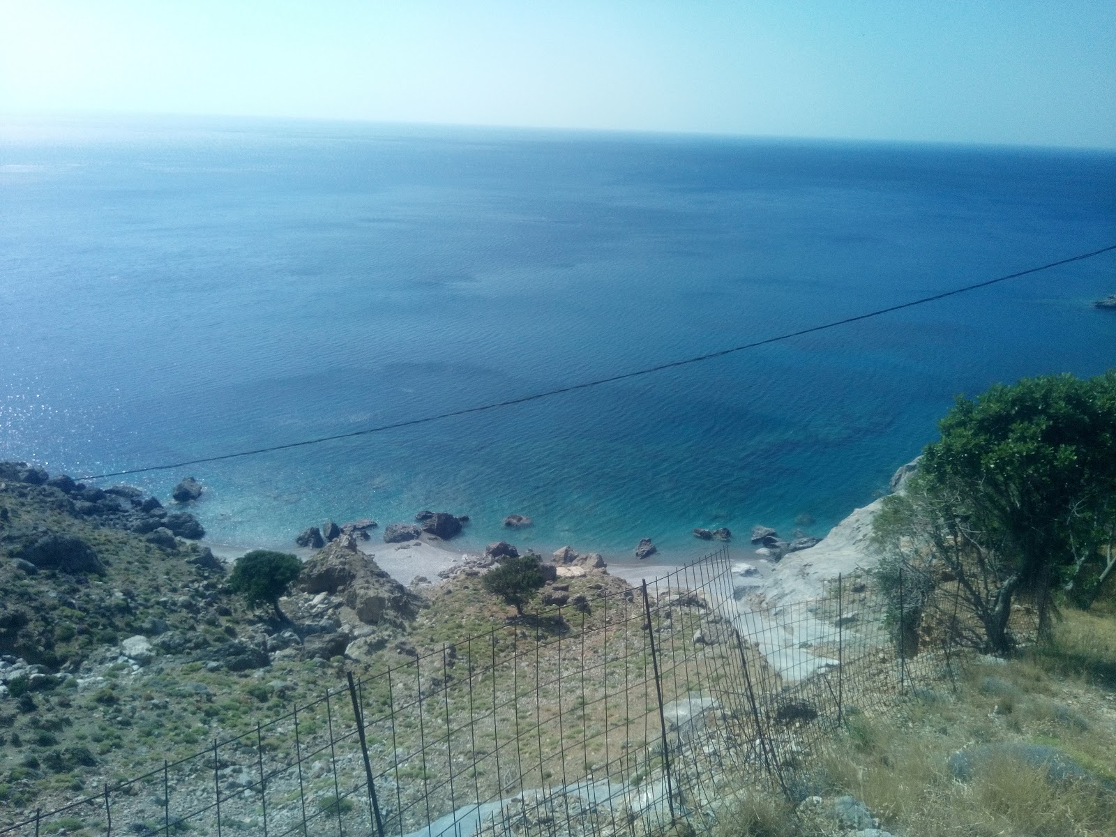 Foto von Kalogerou Arolithos beach mit winzige bucht