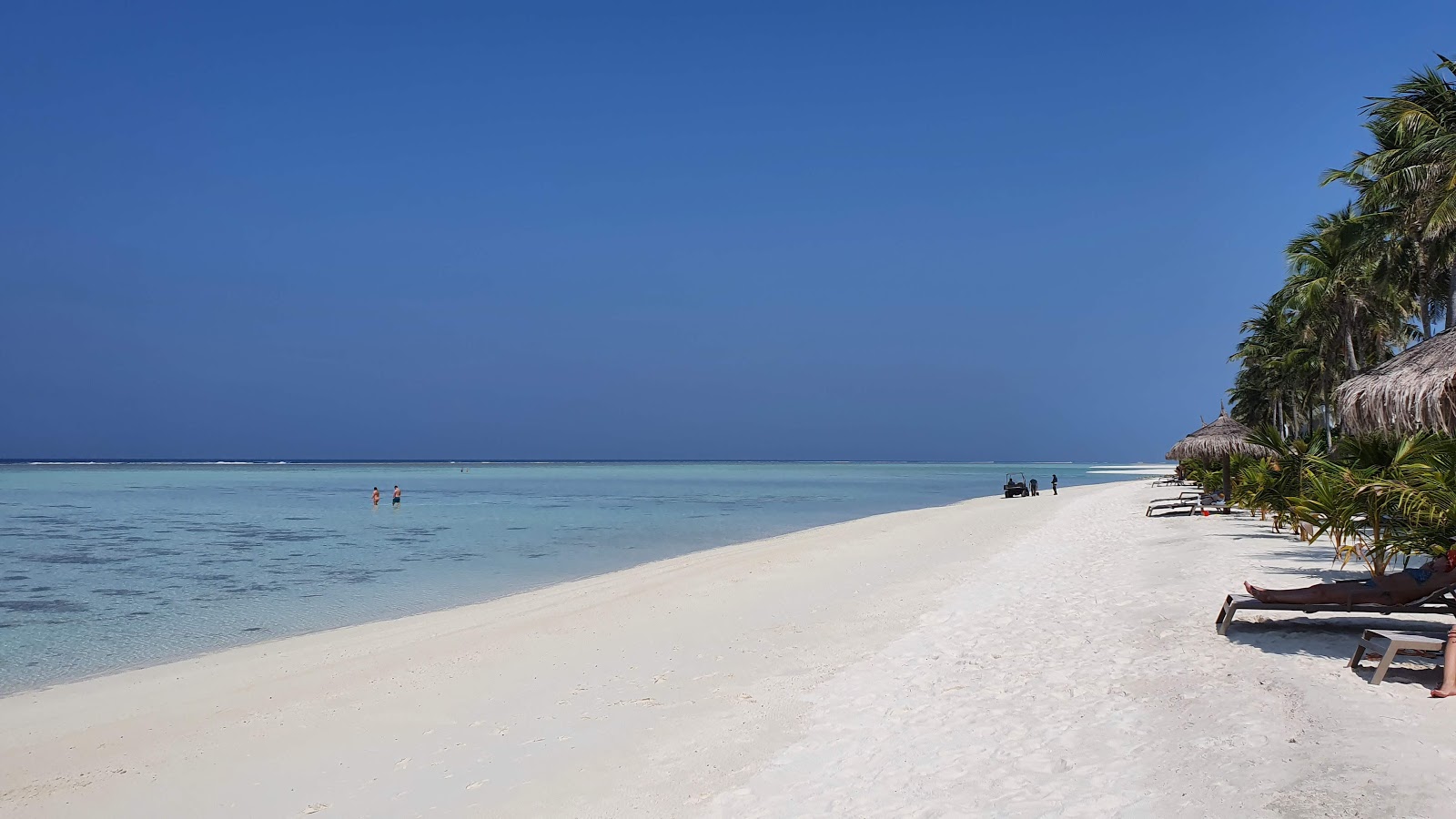 Foto de Riu Resort Beach com areia fina branca superfície