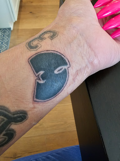 Explore cover up tattoo ideas male chest, creative tattoo ideas in San Diego, available at Sideshow Tattoo and Piercing