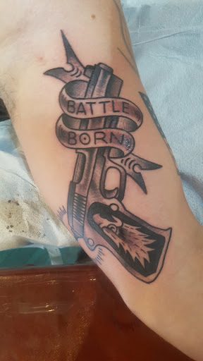 Explore forearm men tattoo ideas, creative tattoo ideas in Reno, available at Aces Tattoo