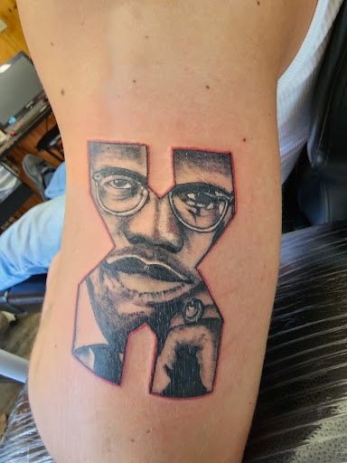 Explore front of neck tattoo ideas, creative tattoo ideas in Charlottesville, available at ScottyrocksTwisted Inks