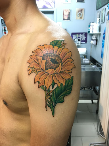 Explore rib tattoo ideas for women, creative tattoo ideas in San Antonio, available at Adrenaline Tattoo & Body Piercing