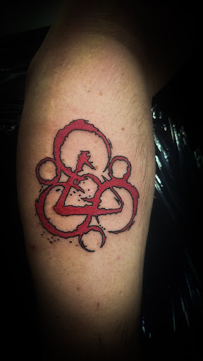 Explore fish tattoo ideas for men, creative tattoo ideas in Fort Worth, available at The Bearded Moon Tattoo Studio