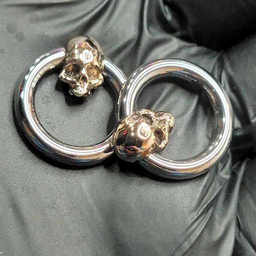 Explore cat and dog tattoo ideas, creative tattoo ideas in Williston, available at Badlands Tattoo And Piercing