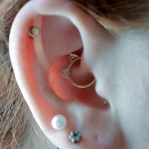 Explore neck tattoo ideas for women, creative tattoo ideas in Reno, available at Black Hole Body Piercing