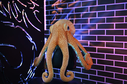 Explore kiss tattoo ideas, creative tattoo ideas in Arlington, available at Lady Octopus Tattoos