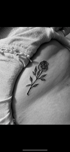 Explore rose and butterfly tattoo ideas, creative tattoo ideas in Rogers, available at Ink Solutions Tattoo