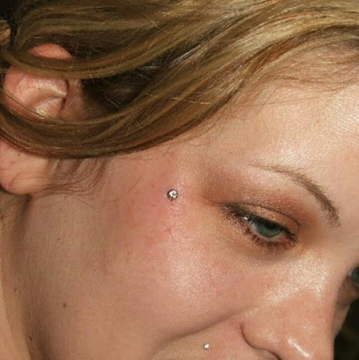 Explore sunshine tattoo ideas, creative tattoo ideas in Dillon, available at Stuck On You Body Piercing