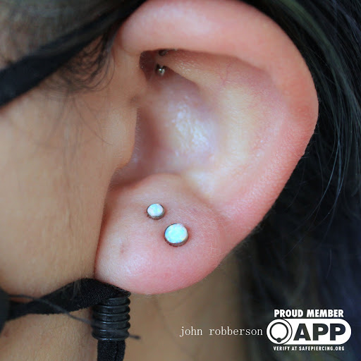 Find book of tattoo ideas for your next unique tattoo in Fort Myers at Tiger Lotus Tattoo and Piercing