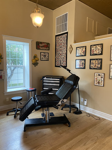 Explore feminine neck tattoo ideas, creative tattoo ideas in Viroqua, available at Tattoo Zuzu