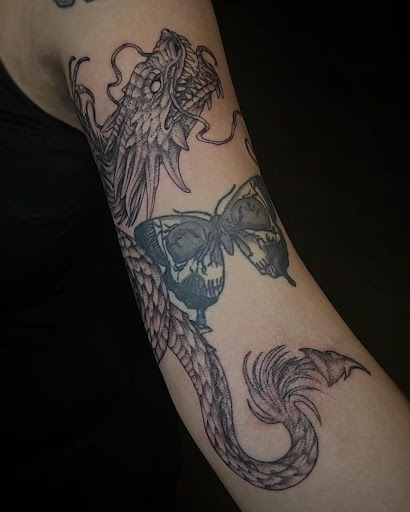 Explore tattoo name ideas on wrist, creative tattoo ideas in Palm Harbor, available at Angry Owl Tattoo and Piercing