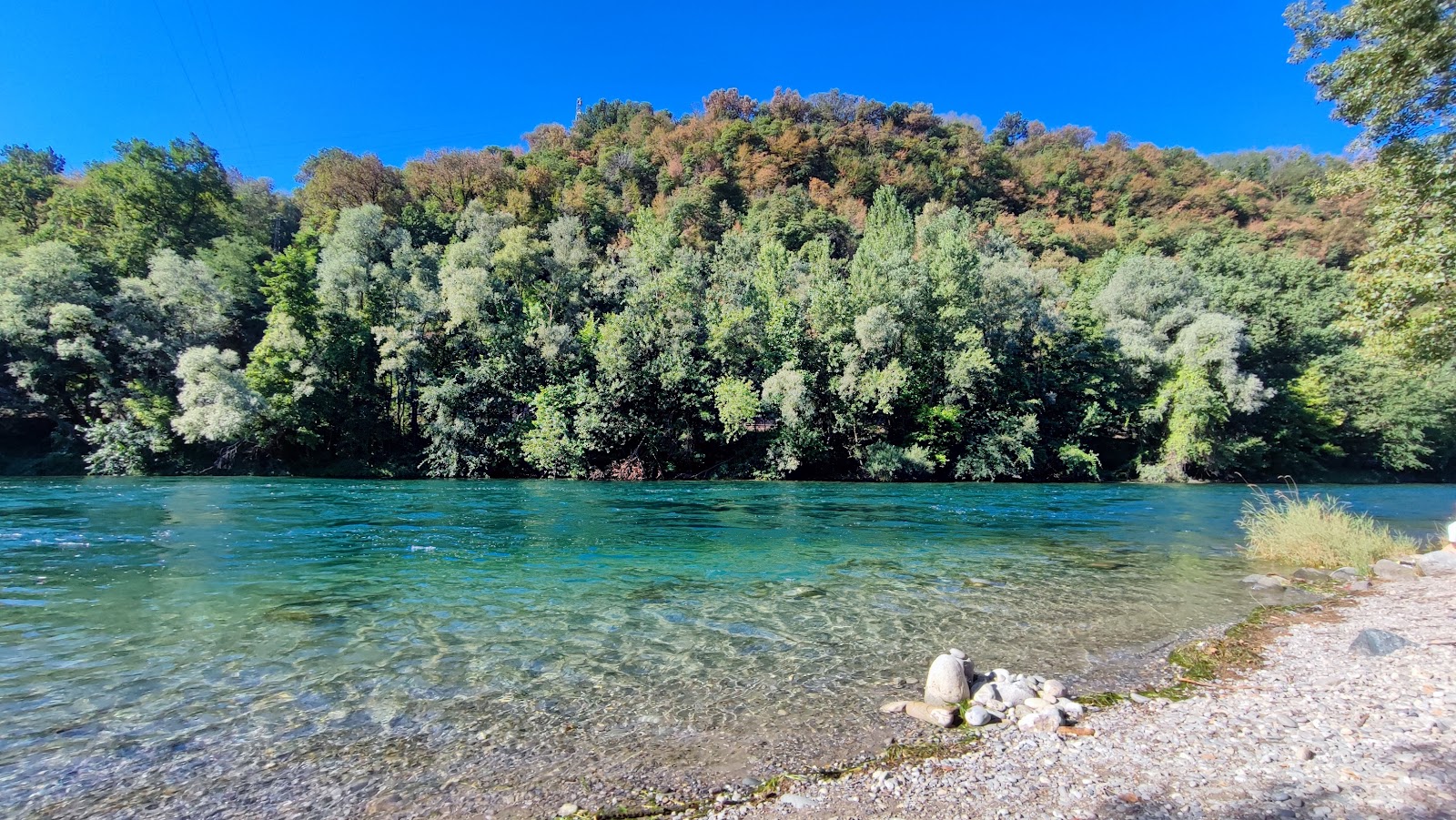 Zdjęcie Plaża Medolago z powierzchnią turkusowa czysta woda