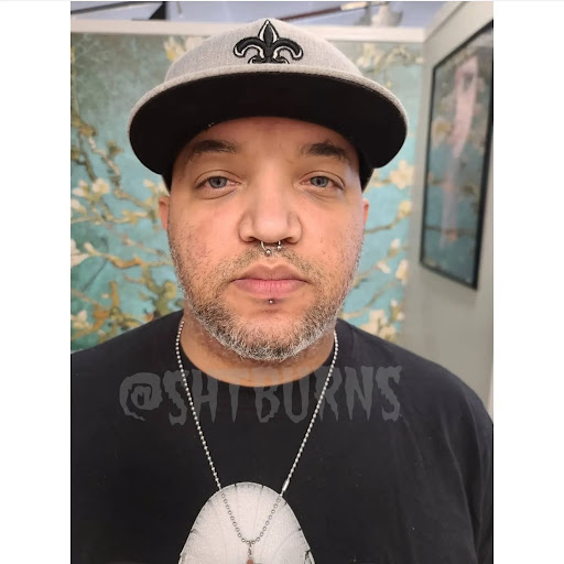 Explore negative tattoo ideas, creative tattoo ideas in Charleston, available at Exotic Impressions Body Piercing