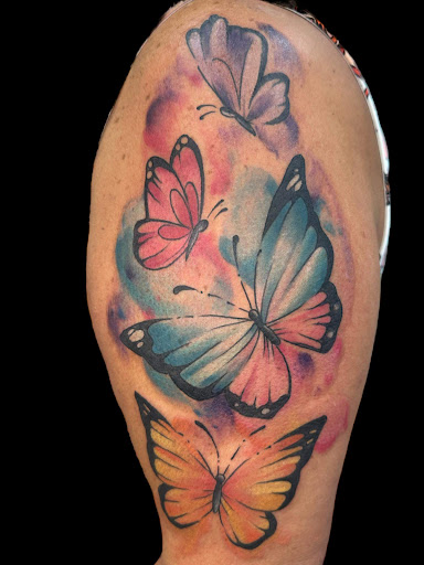 Explore tattoo ideas for mother of twins, creative tattoo ideas in Summerfield, available at Diamond Tattoos & Body Piercings