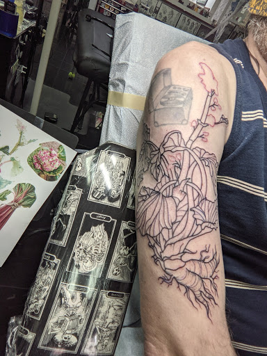 Explore stomach tattoo ideas for women, creative tattoo ideas in Baltimore, available at Saints & Sinners Tattoos (NO piercings)