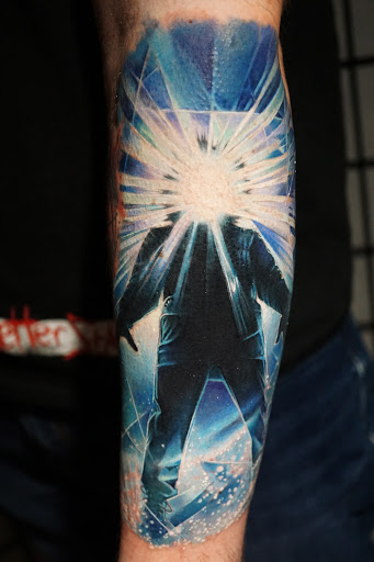 Explore leg tattoo ideas for men, creative tattoo ideas in Champaign, available at Moonlight Studios Tattoo