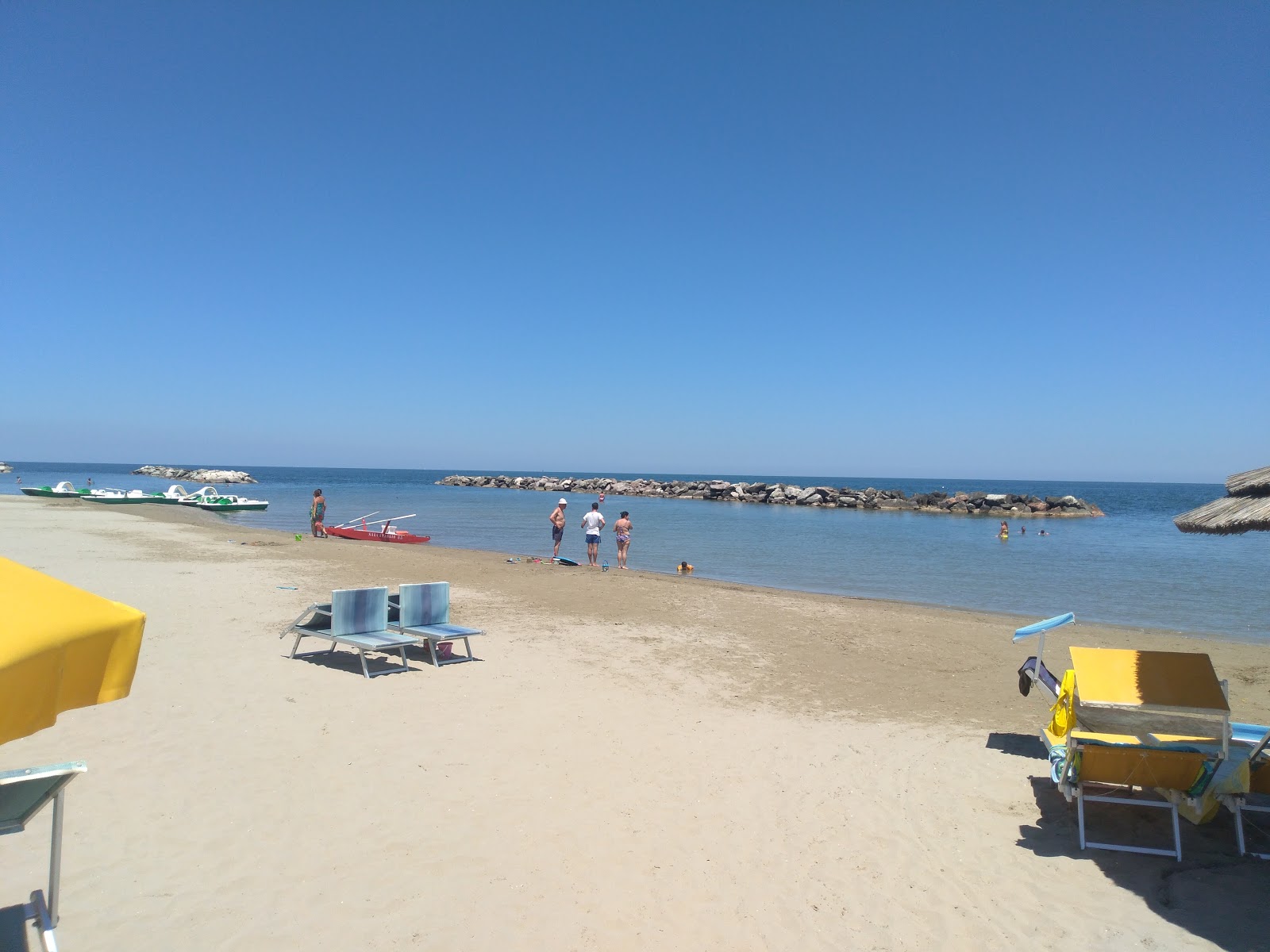 Foto av Torre Pedrera Beach och bosättningen