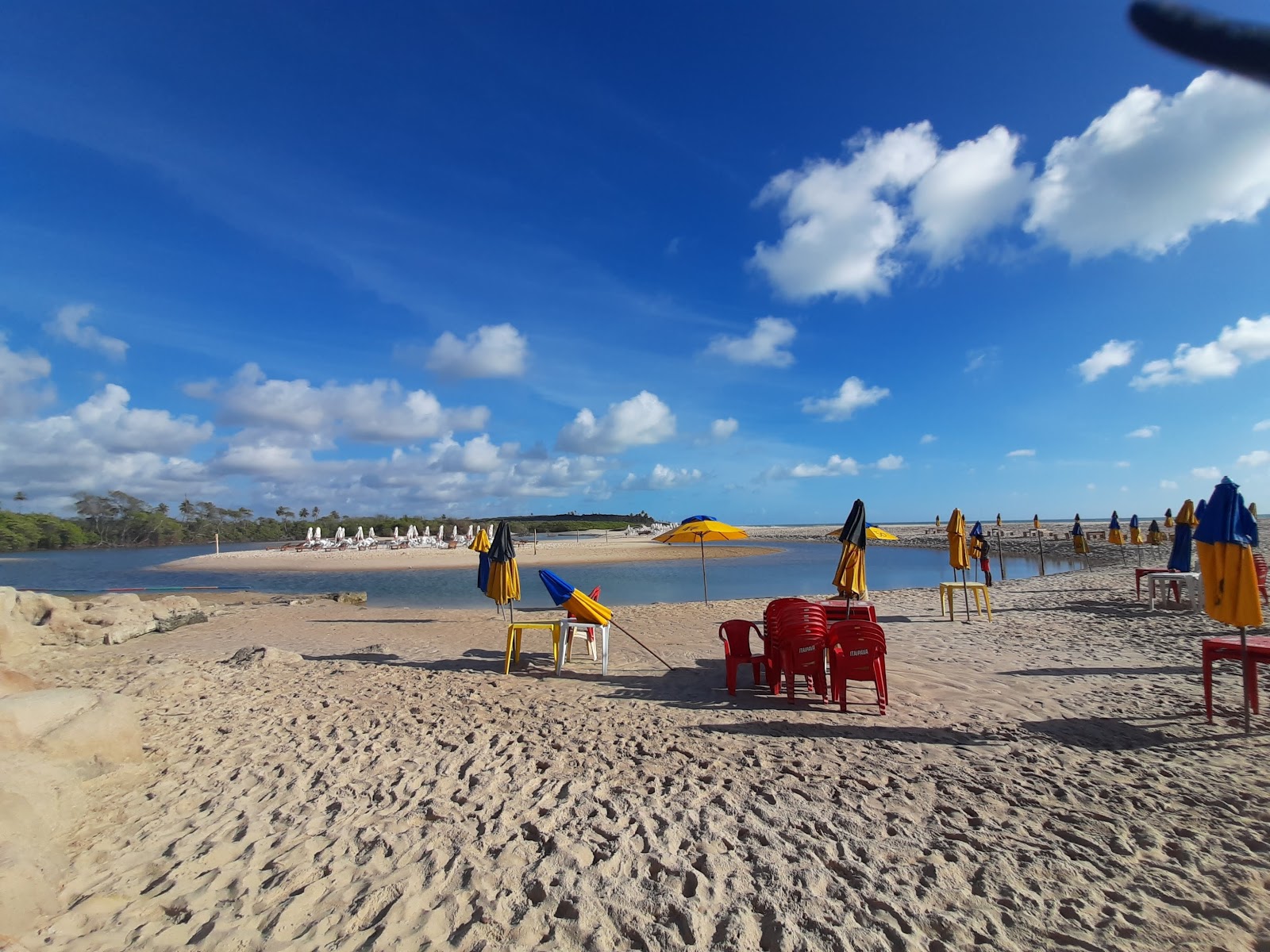 Foto av Stranden Barra do Grau och bosättningen