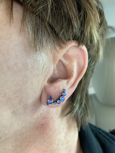 Explore cool arm sleeve tattoo ideas, creative tattoo ideas in Tulsa, available at Brookside Body Piercing Tattoo