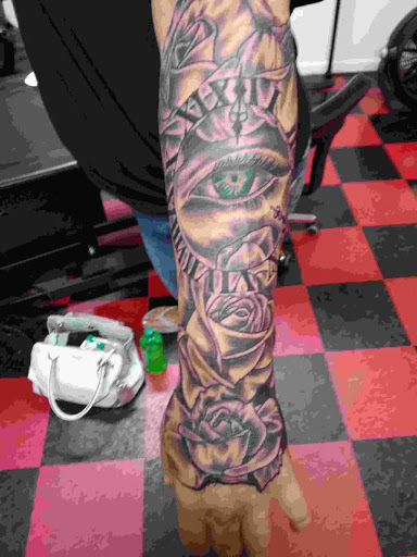 Explore dead rose tattoo ideas, creative tattoo ideas in Fort Dodge, available at Black Diamond Tattoo Studio