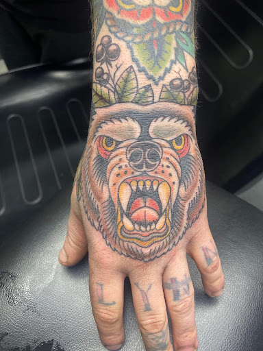 Explore upper arm men tattoo ideas, creative tattoo ideas in Marine City, available at Ruby Tattoo