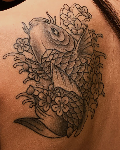 Explore small coraline tattoo ideas, creative tattoo ideas in Addison, available at Cat Tattoo