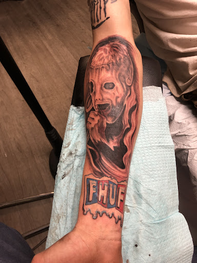 Explore golden retriever tattoo ideas, creative tattoo ideas in Spokane, available at Platinum Rose Tattoo Studio