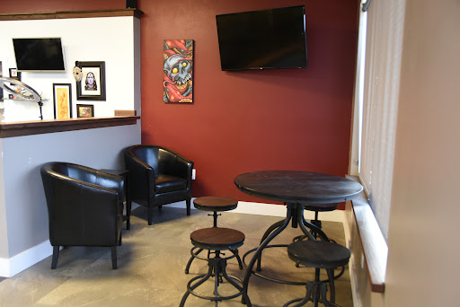 Explore calligraphy tattoo ideas, creative tattoo ideas in Fond Du Lac, available at Gallery 83 Tattoo Co.