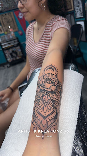 Find creative number tattoo ideas for your next unique tattoo in Uvalde at Artistik Kreationz 96