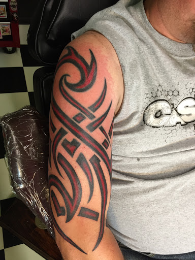 Explore sleeve filler tattoo ideas, creative tattoo ideas in Hamilton, available at Glass Ink Tattoo