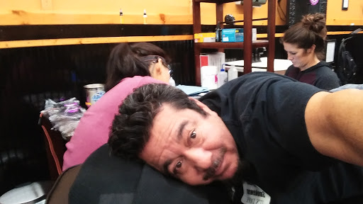 Explore painting tattoo ideas, creative tattoo ideas in Fort Smith, available at Hanging City Body Modification