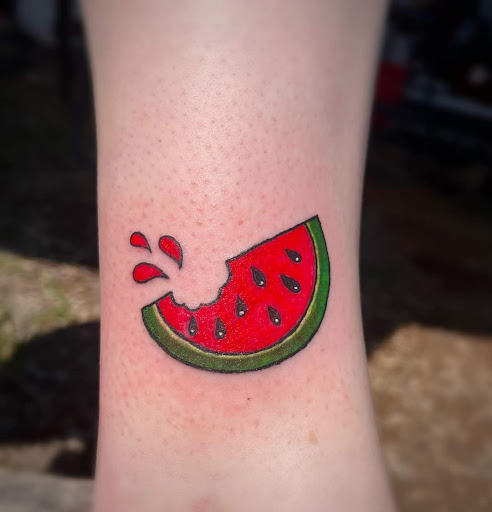 Explore ideas for leg sleeve tattoos, creative tattoo ideas in Benton, available at Spectrum Tattoo