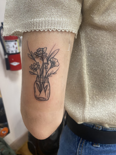 Explore skull cover up tattoo ideas, creative tattoo ideas in Galveston, available at Body Language Tattoo & Piercing Studio