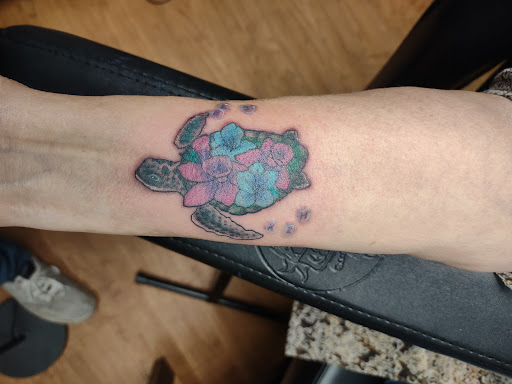 Explore guam tattoo ideas, creative tattoo ideas in Williamston, available at Inkd Tattoo Parlor