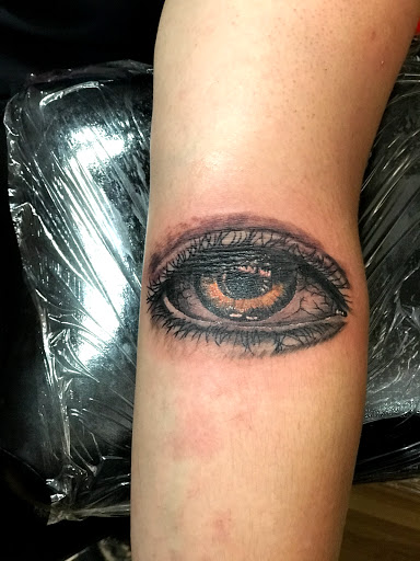 Explore half arm sleeve tattoo ideas, creative tattoo ideas in Baytown, available at Big Juniors Tattoos