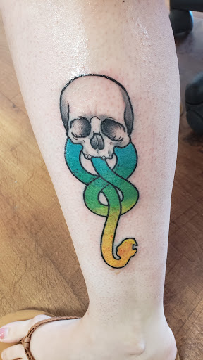 Explore arrowhead tattoo ideas, creative tattoo ideas in Apple Valley, available at Tried and True Tattoo Parlor