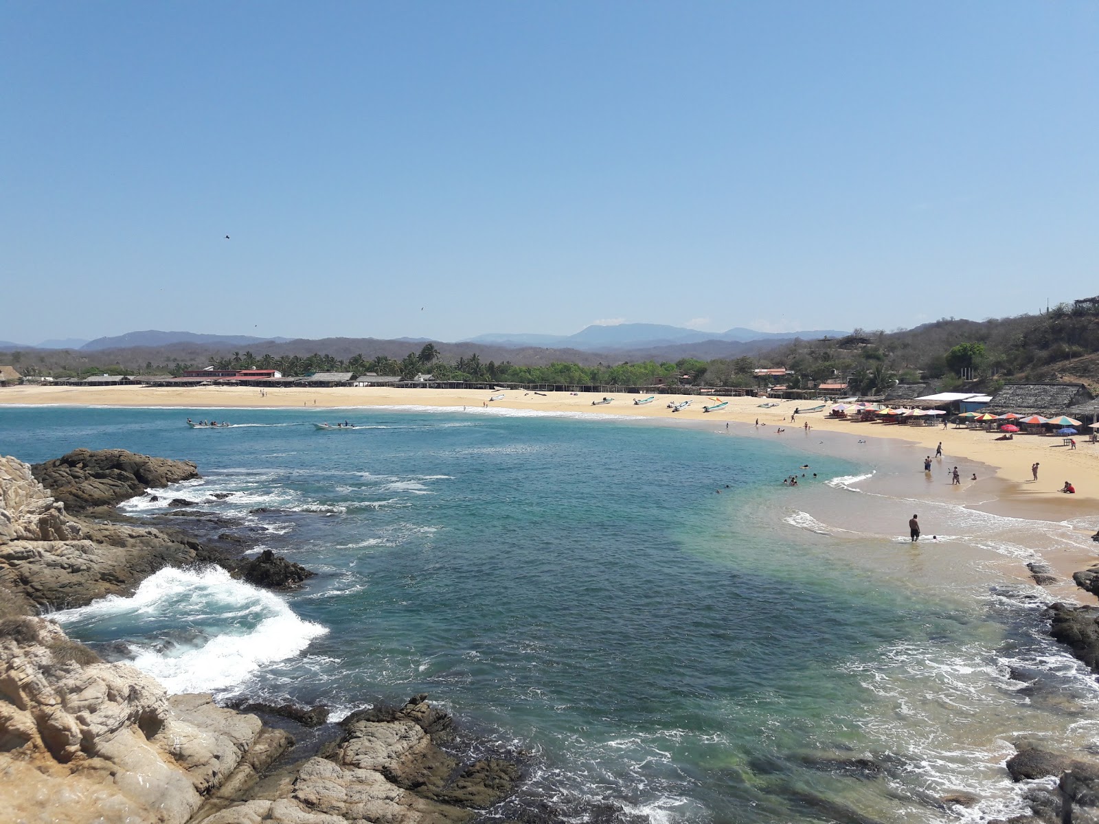 Zdjęcie Playa el Faro z powierzchnią drobny beżowy piasek