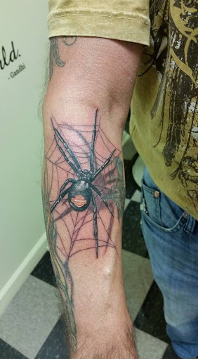 Explore puppy tattoo ideas, creative tattoo ideas in Pendleton, available at Just Another Hole in the Wall Tattoo