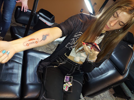 Explore arrow tattoo ideas for guys, creative tattoo ideas in Charleston, available at Poor Boys Tattoo, LLC