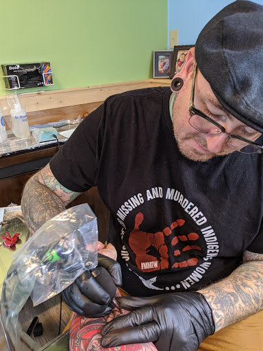 Explore tattoo ideas cover up names, creative tattoo ideas in Powell, available at Hummingbird Tattoo Studio