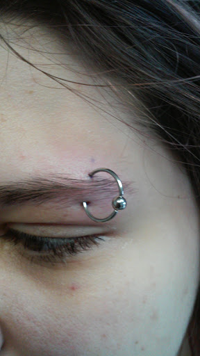 Explore tattoo name placement ideas, creative tattoo ideas in Asheville, available at Aacross The Skin Tattoo Shop